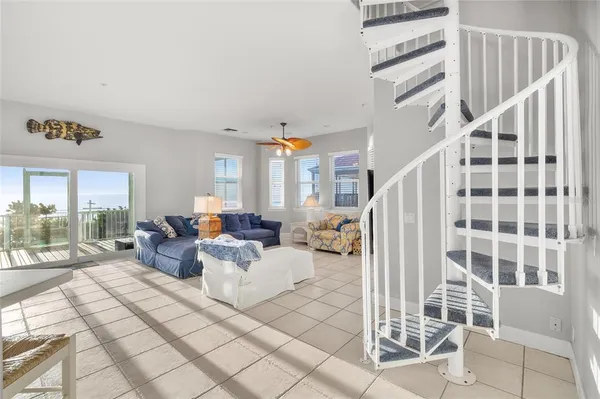 a kitchen view with cabinets a sink a window and appliances