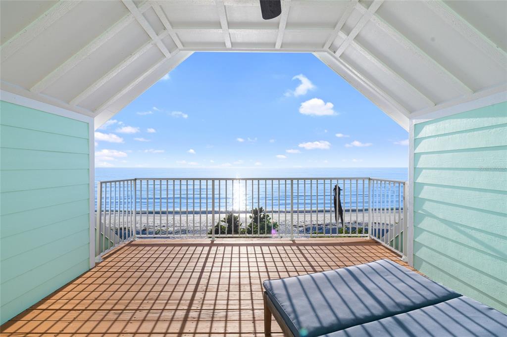 8798 Grand Avenue Boca Grande, FL 33921 - Photo 25 of 64 a view of balcony with wooden floor