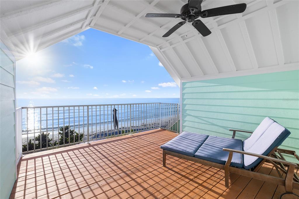8798 Grand Avenue Boca Grande, FL 33921 - Photo 26 of 64 a view of a patio with wooden floor