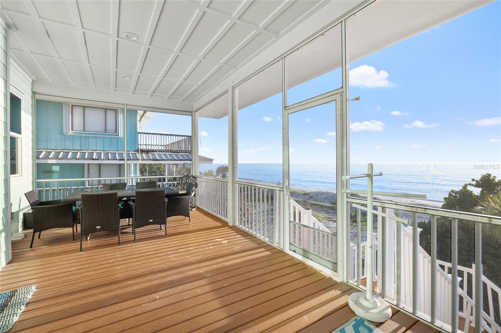 8798 Grand Avenue Boca Grande, FL 33921 - Photo 3 of 64 a view of a balcony with wooden floor