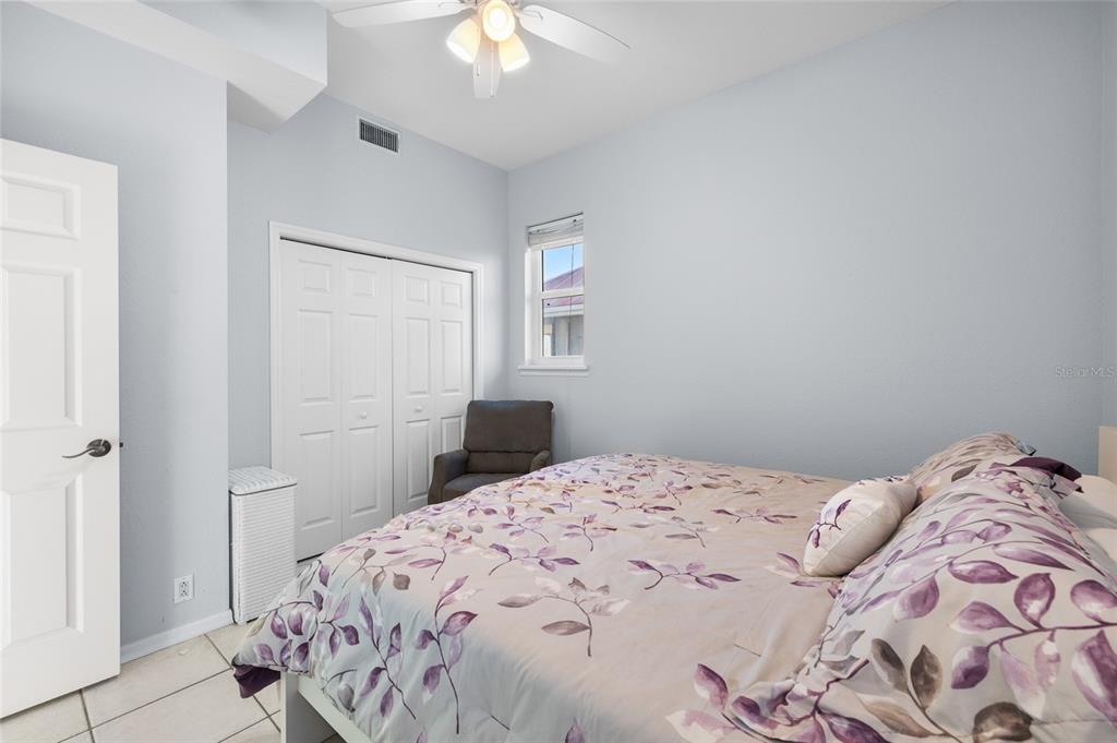 8798 Grand Avenue Boca Grande, FL 33921 - Photo 39 of 64 a bedroom with a bed and a window