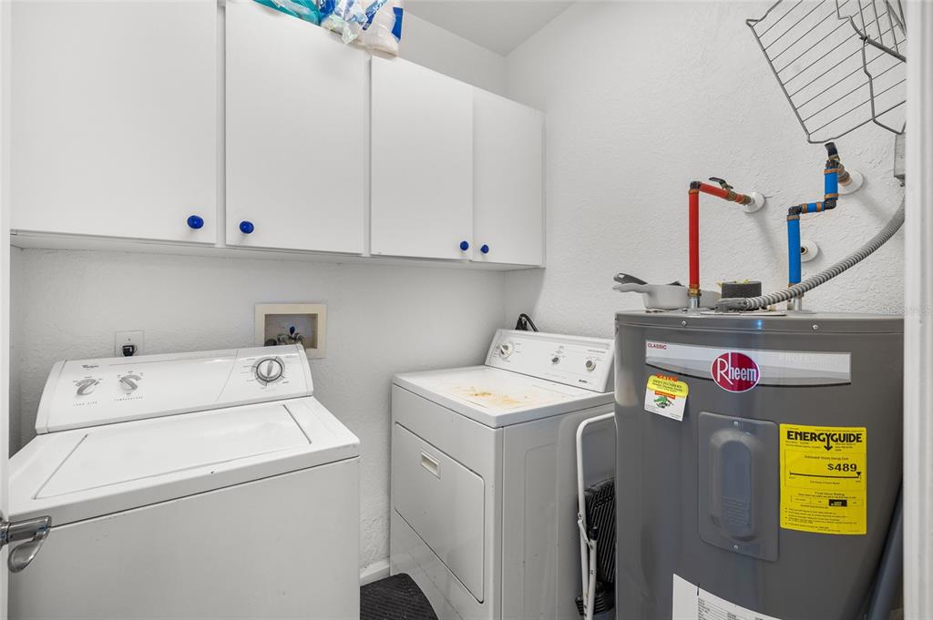 8798 Grand Avenue Boca Grande, FL 33921 - Photo 41 of 64 a utility room with dryer and washer