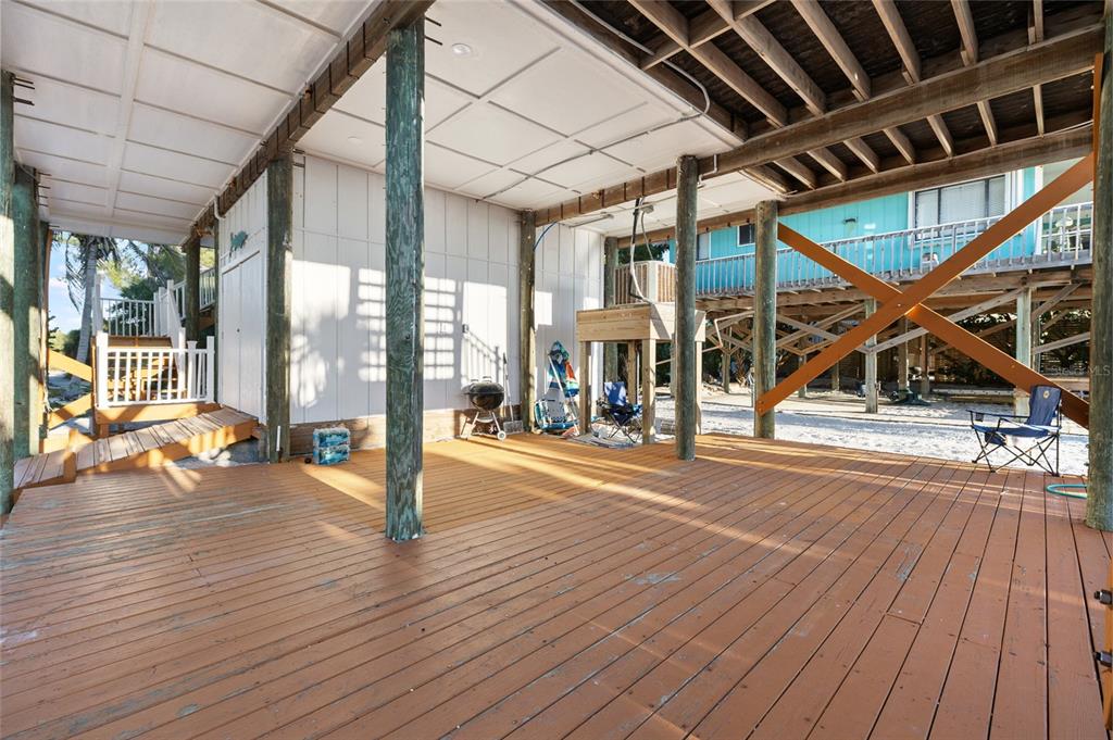 8798 Grand Avenue Boca Grande, FL 33921 - Photo 46 of 64 a view of a hall with wooden floor