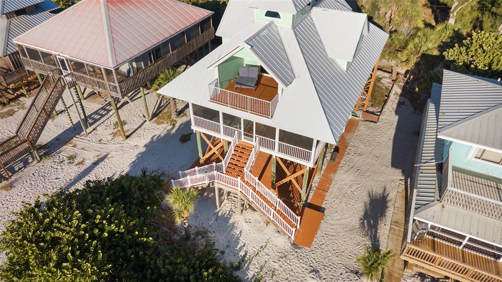 8798 Grand Avenue Boca Grande, FL 33921 - Photo 53 of 64 an aerial view of a house with a yard