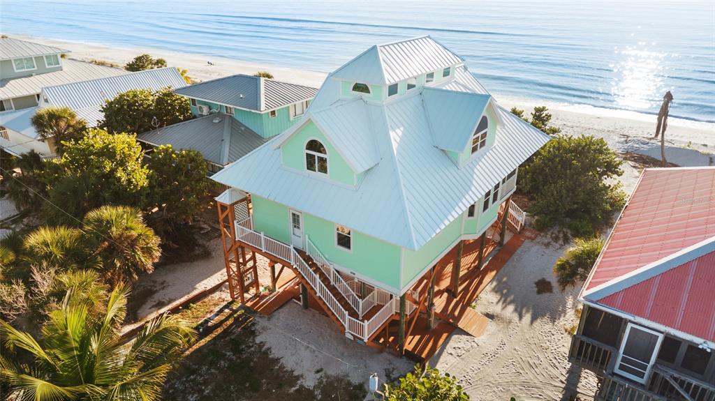 8798 Grand Avenue Boca Grande, FL 33921 - Photo 54 of 64 an aerial view of a house with a yard