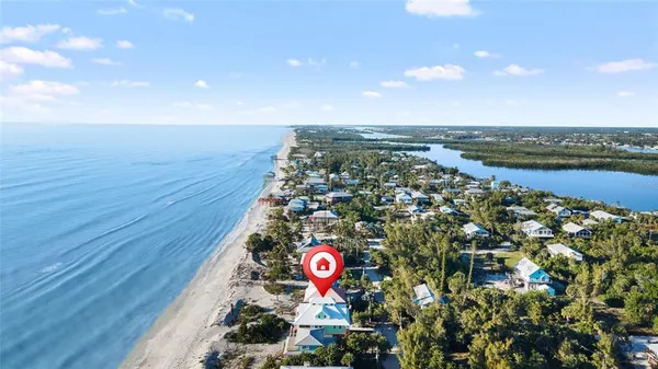 a view of city with ocean