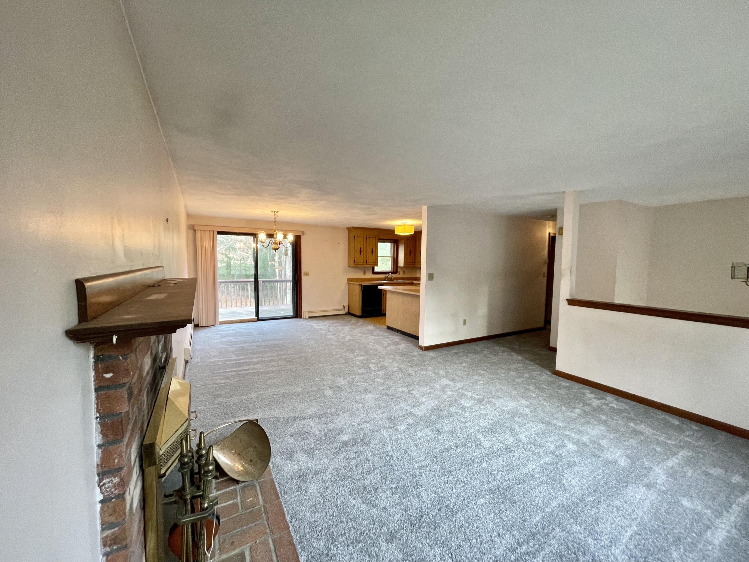 103 Clay Pond Road Bourne, MA 02532 - Photo 7 of 26 a view of livingroom with furniture and closet