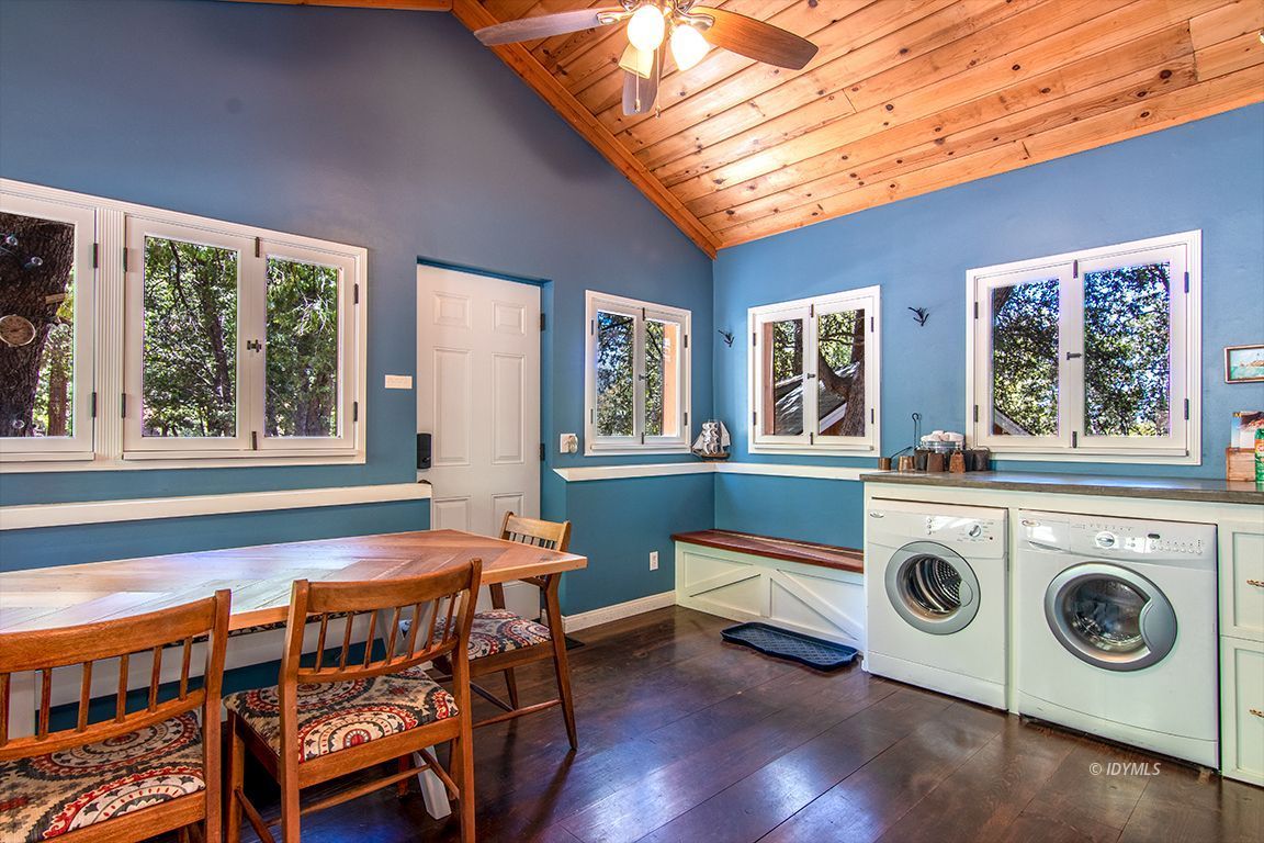 25670 Glen Road Idyllwild, CA 92549 - Photo 18 of 66 a dining room with a furniture and windows