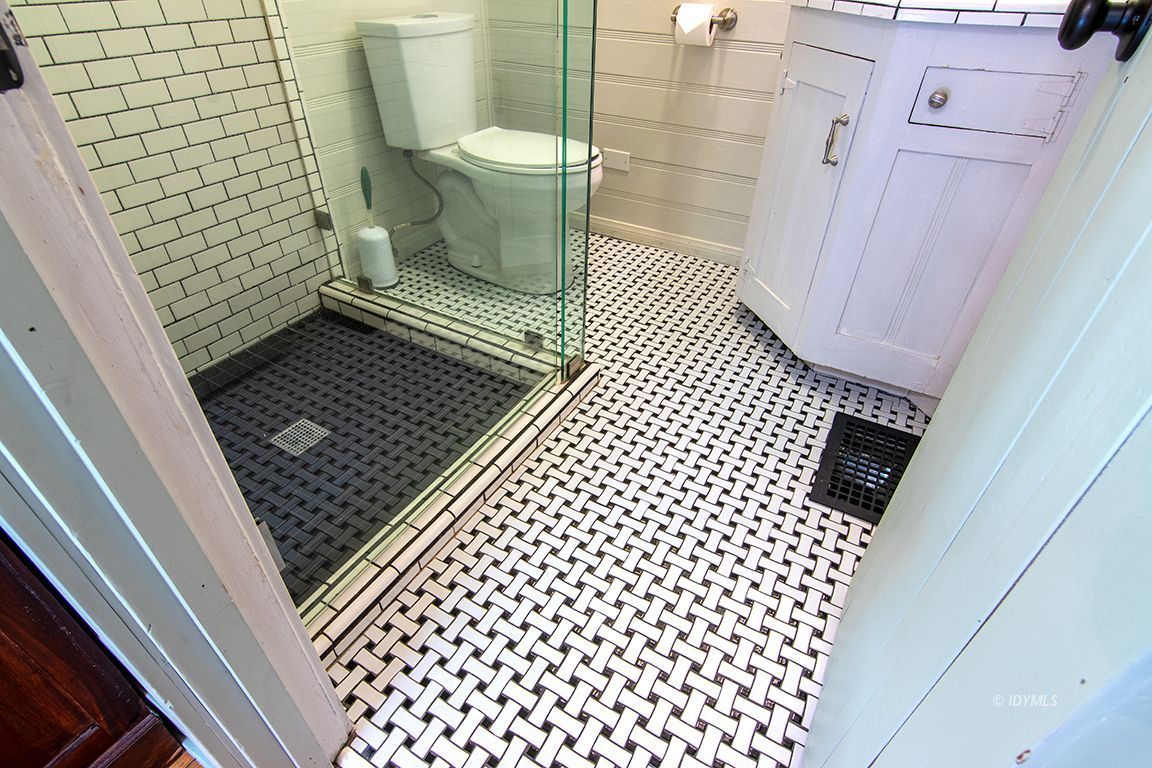 25670 Glen Road Idyllwild, CA 92549 - Photo 21 of 66 a bathroom with a sink a toilet a shower and a mirror
