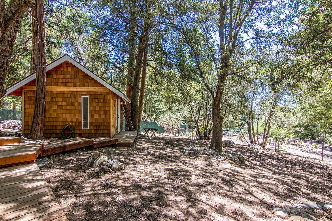 25670 Glen Road Idyllwild, CA 92549 - Photo 30 of 66 a view of a house with a yard