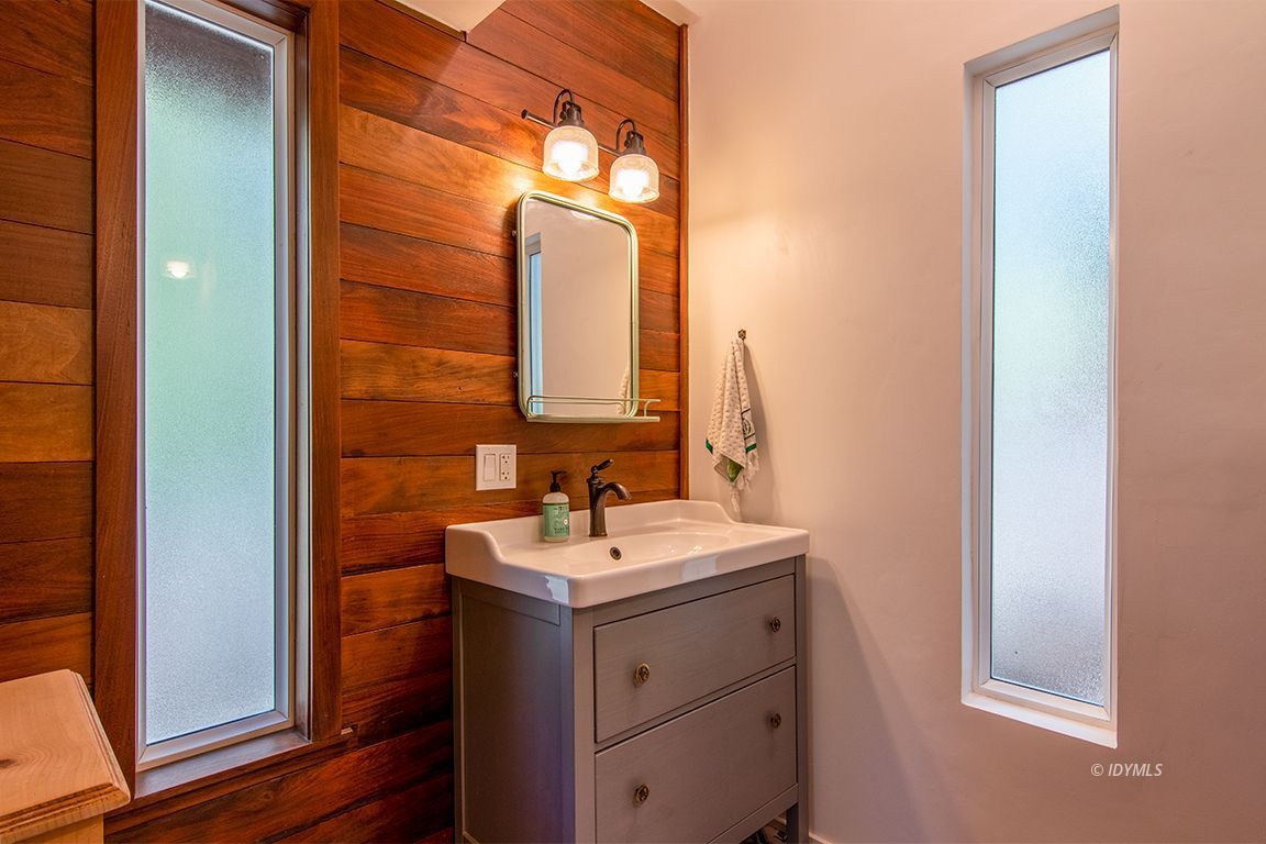 25670 Glen Road Idyllwild, CA 92549 - Photo 41 of 66 a bathroom with a sink and a mirror