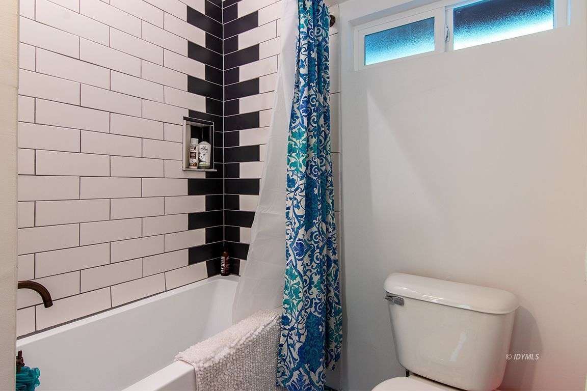 25670 Glen Road Idyllwild, CA 92549 - Photo 42 of 66 a bathroom with a toilet and shower