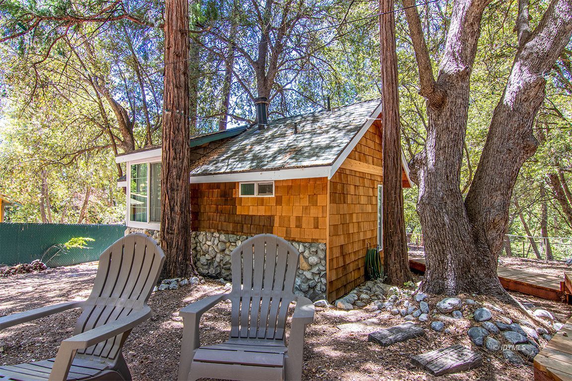 25670 Glen Road Idyllwild, CA 92549 - Photo 47 of 66 a view of a house with backyard and sitting area