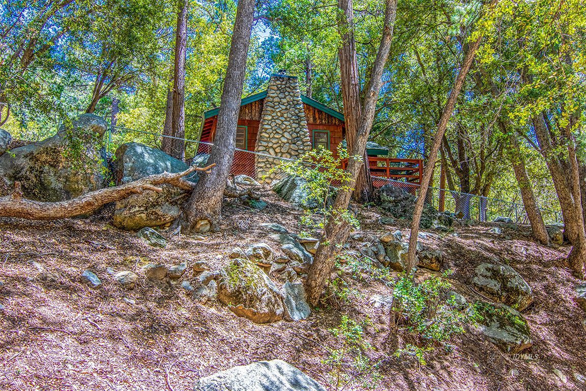 25670 Glen Road Idyllwild, CA 92549 - Photo 56 of 66 a backyard of a house with lots of green space