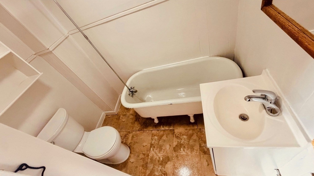 245 County Street, Unit 10 Fall River, MA 02723 - Photo 9 of 9 a bathroom with a bathtub and toilet