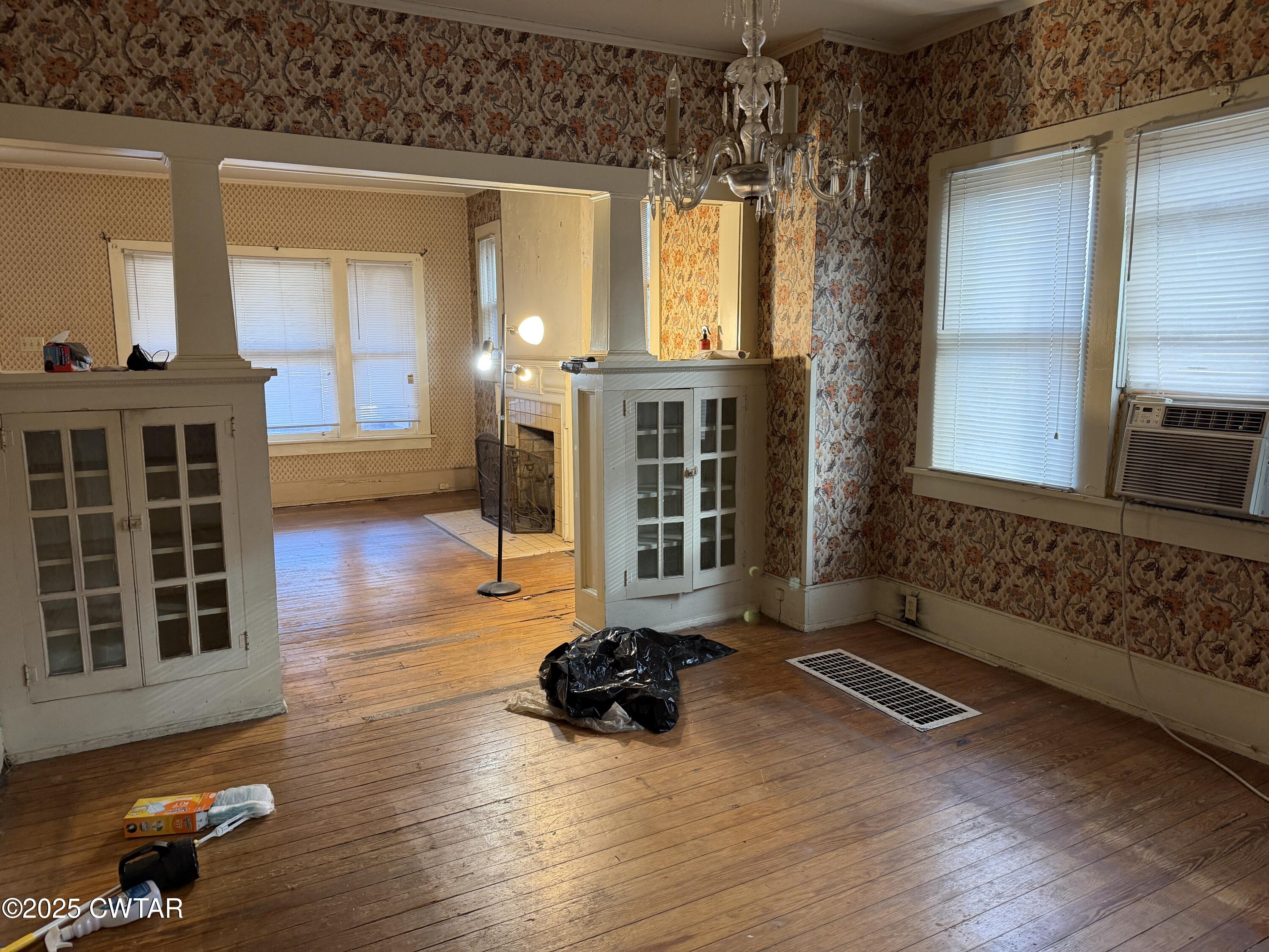 400 West Grand Street Jackson, TN 38301 - Photo 6 of 13 a view of a room with wooden floor and windows