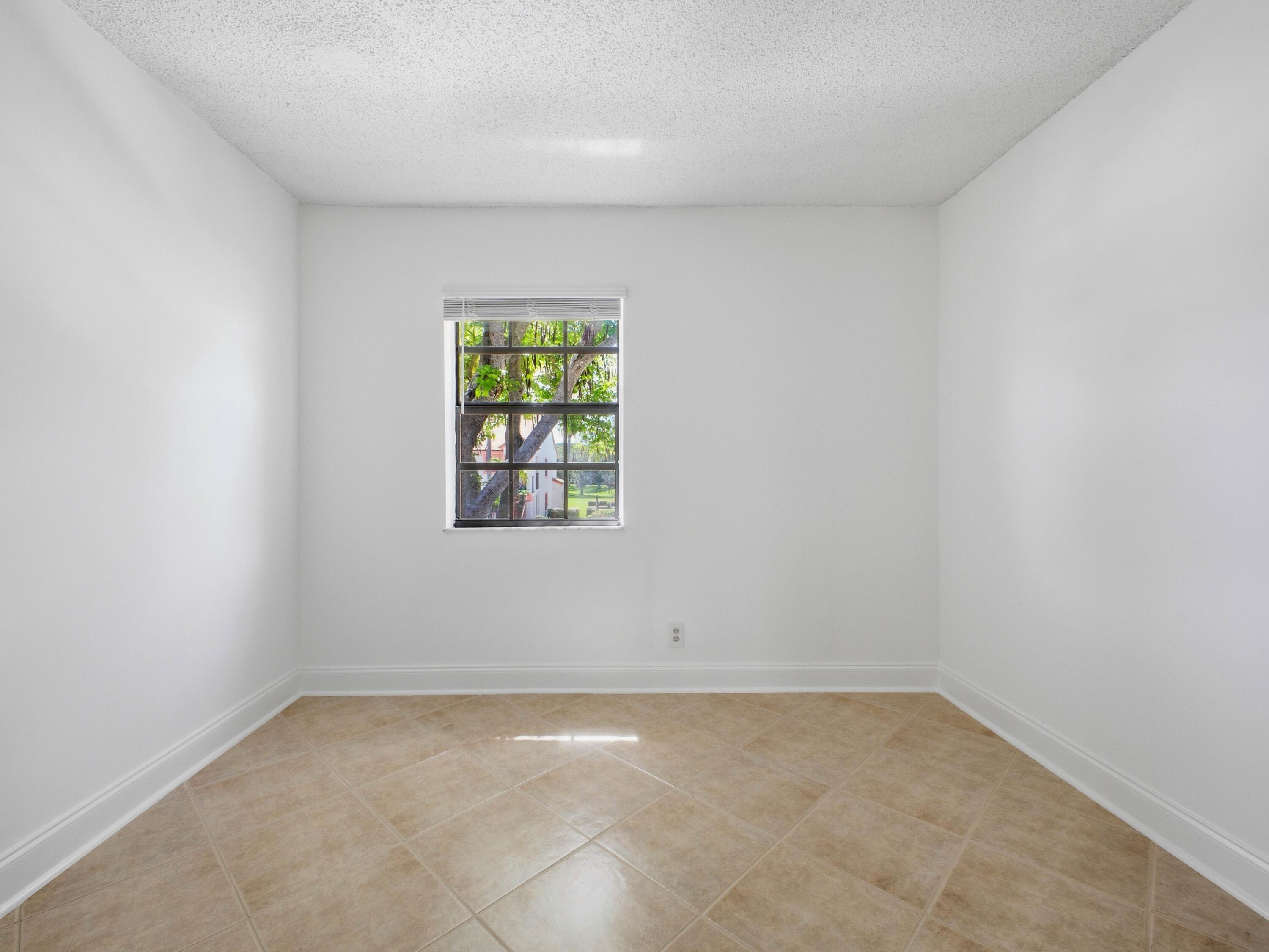 321 Norwood Terrace, Unit N221 Boca Raton, FL 33431 - Photo 19 of 36 Guest Bedroom
