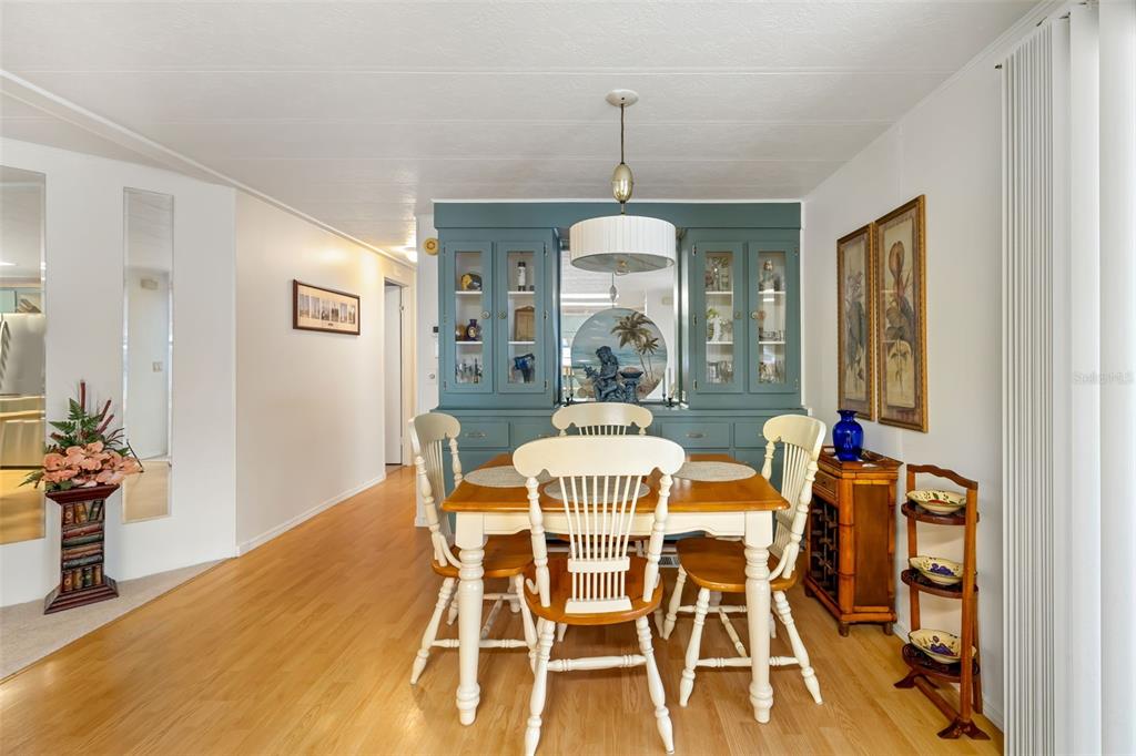 5619 Bayshore Road, Unit 423 Palmetto, FL 34221 - Photo 17 of 55 a view of a dining room with furniture window and wooden floor
