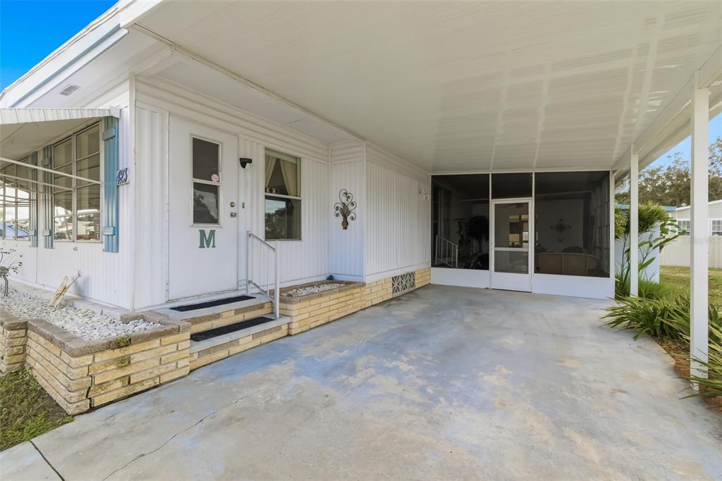 5619 Bayshore Road, Unit 423 Palmetto, FL 34221 - Photo 2 of 55 a view of an house with backyard and porch