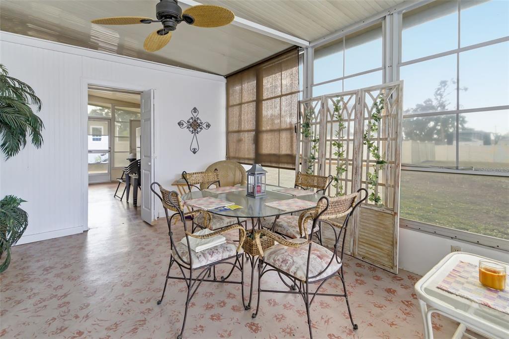 5619 Bayshore Road, Unit 423 Palmetto, FL 34221 - Photo 29 of 55 a dining room with furniture and window