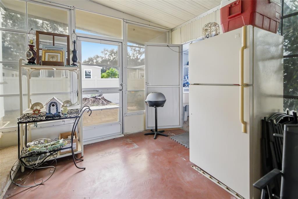 5619 Bayshore Road, Unit 423 Palmetto, FL 34221 - Photo 32 of 55 a view of a kitchen with refrigerator and workspace
