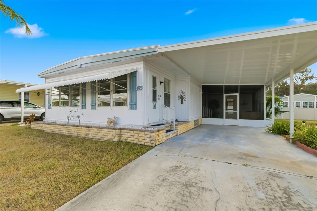 5619 Bayshore Road, Unit 423 Palmetto, FL 34221 - Photo 55 of 55 a view of a house with swimming pool and porch