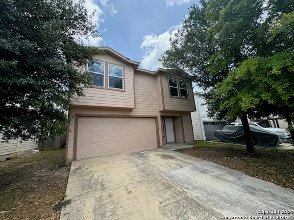 a house view with a outdoor space