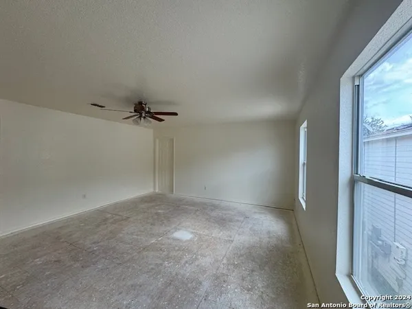 a view of a room with an empty space