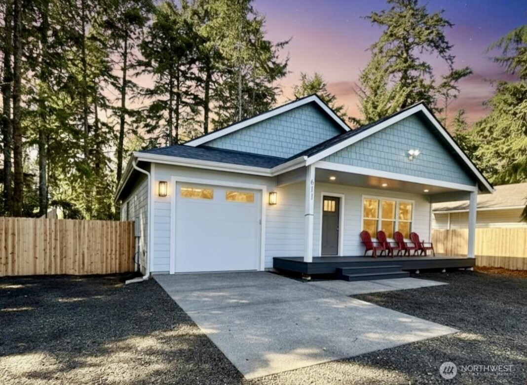 a front view of a house with garage