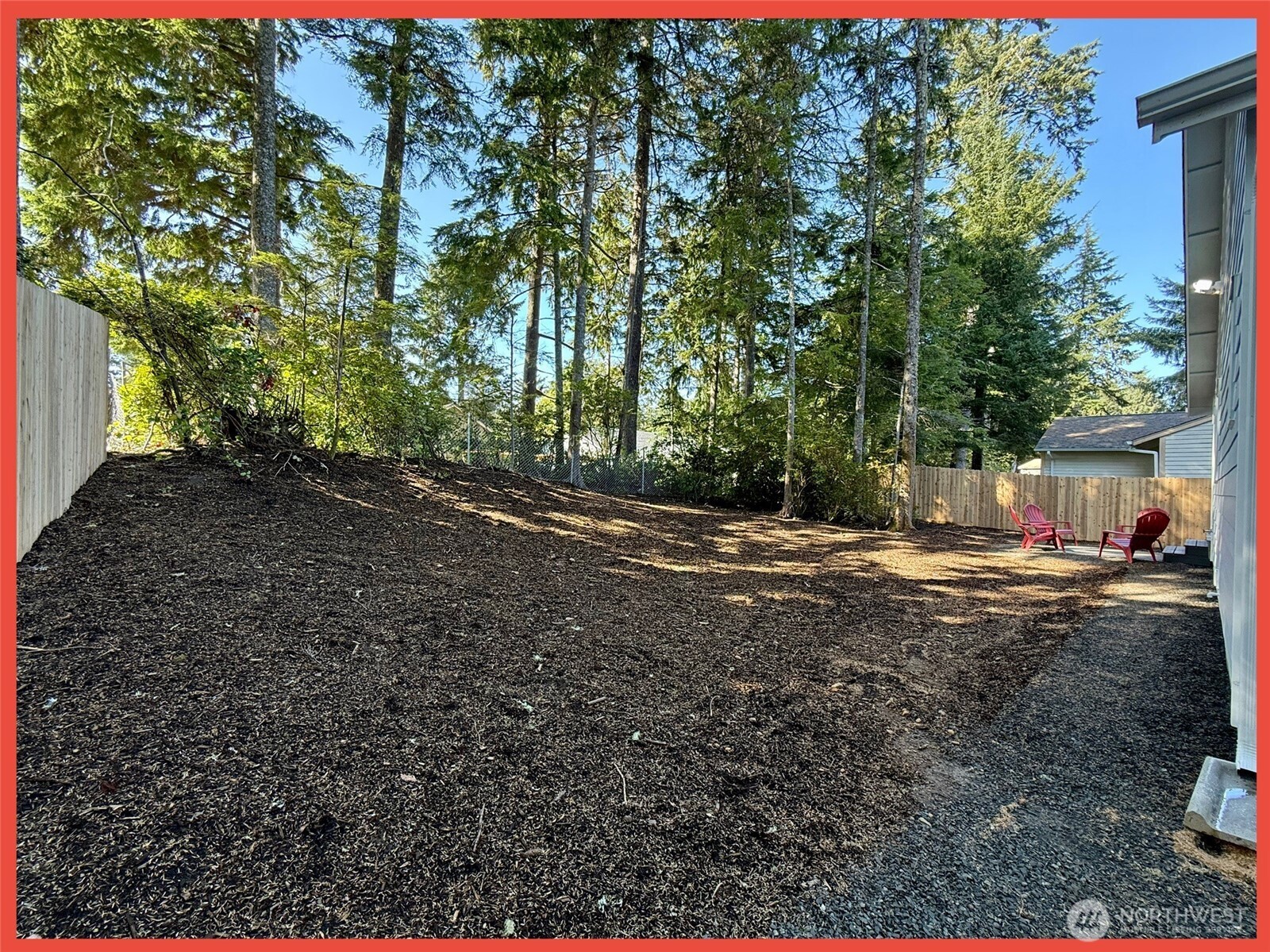 611 Weatherwax Loop Northeast Ocean Shores, WA 98569 - Photo 11 of 39 a view of a yard with tree s