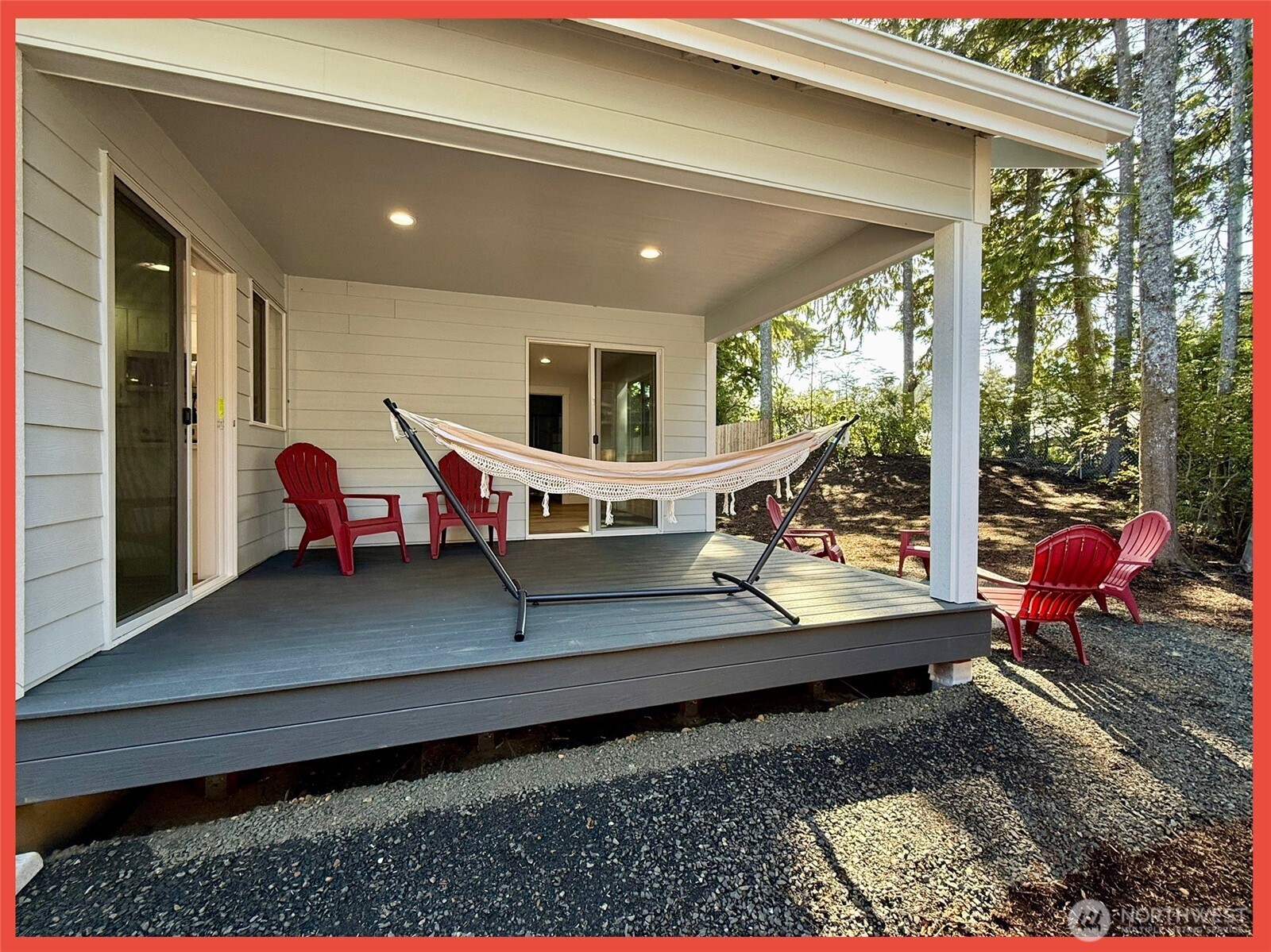 611 Weatherwax Loop Northeast Ocean Shores, WA 98569 - Photo 9 of 39 a sitting area with furniture and outdoor space