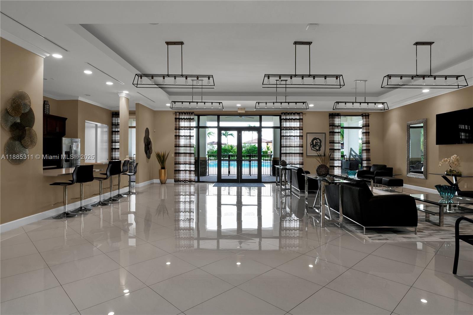 627 Southeast 34th Avenue Homestead, FL 33033 - Photo 13 of 17 a large kitchen with lots of counter space and windows