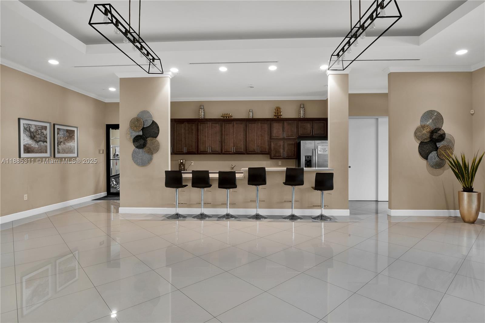 627 Southeast 34th Avenue Homestead, FL 33033 - Photo 14 of 17 a view of kitchen with stainless steel appliances kitchen island granite countertop a refrigerator and a sink