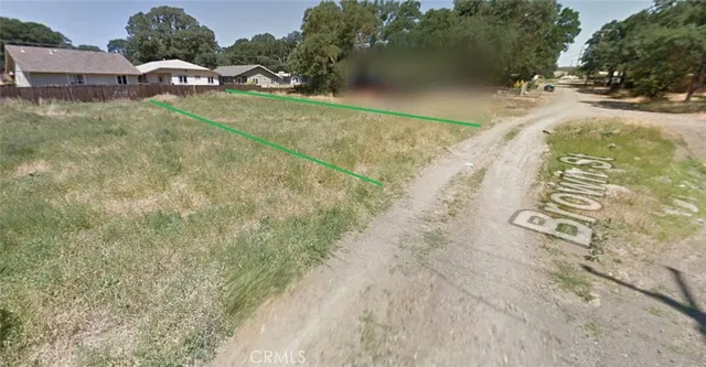 a view of swimming pool with a yard