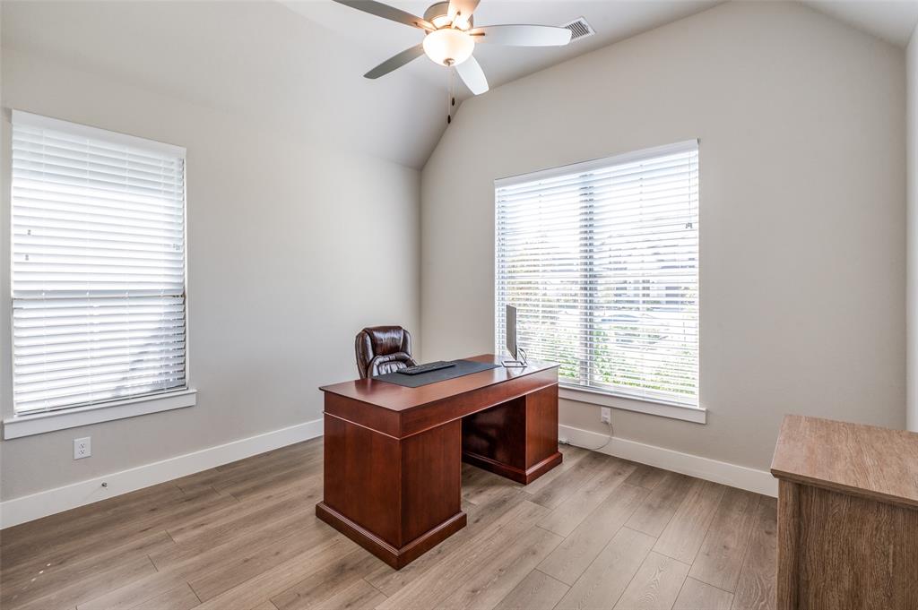 2901 Quinton Street Prosper, TX 75078 - Photo 3 of 24 a view of a room with wooden floor and windows