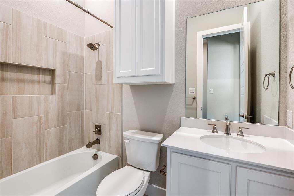 2901 Quinton Street Prosper, TX 75078 - Photo 4 of 24 a bathroom with a sink toilet and shower