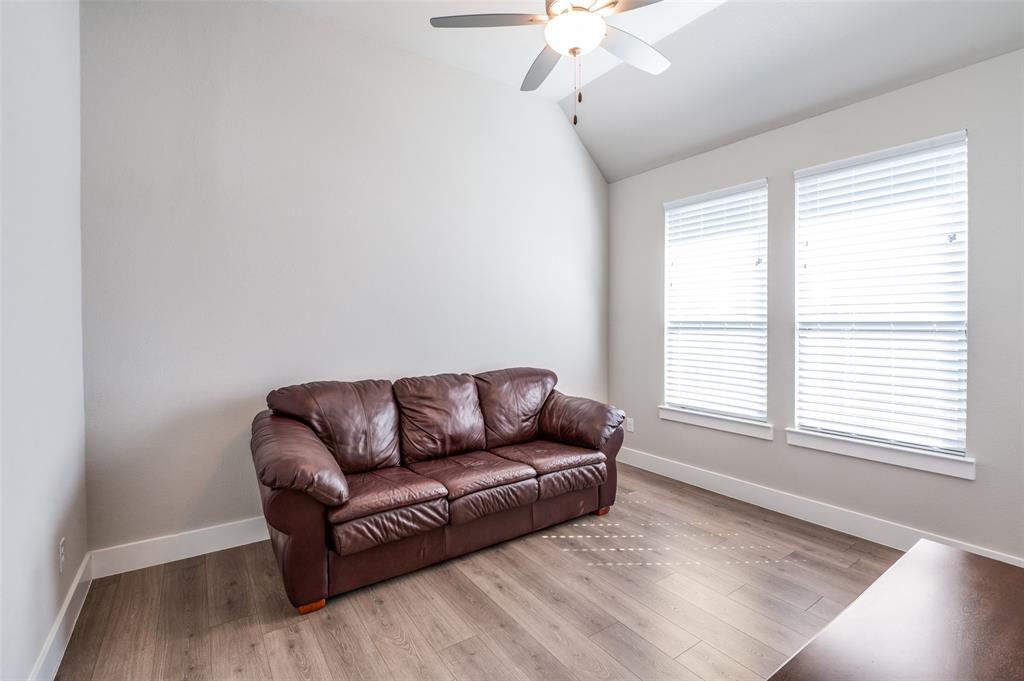 2901 Quinton Street Prosper, TX 75078 - Photo 5 of 24 a living room with furniture and a window