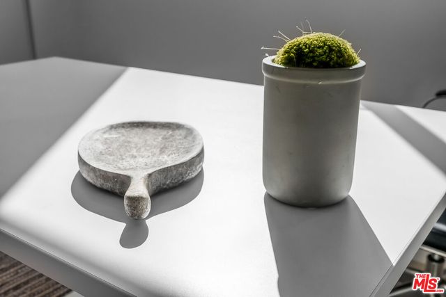 a view of a living room with a washer and dryer