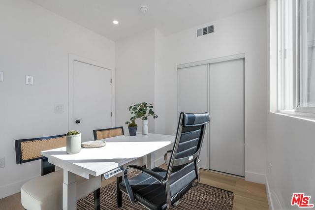 a view of a dining room with furniture