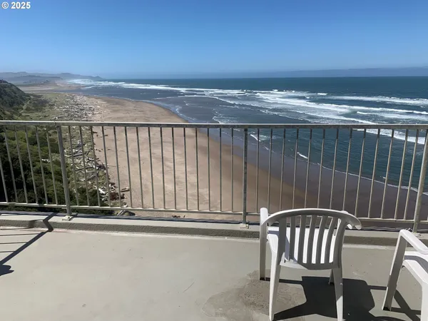 a view of a balcony with an outdoor space