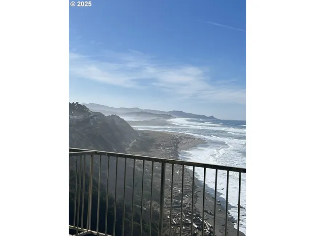 a view of a balcony with an outdoor space