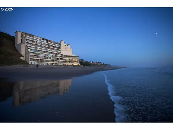 a view of staircase with wooden floor