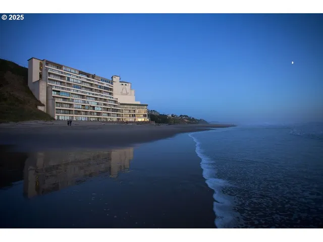 a view of staircase with wooden floor