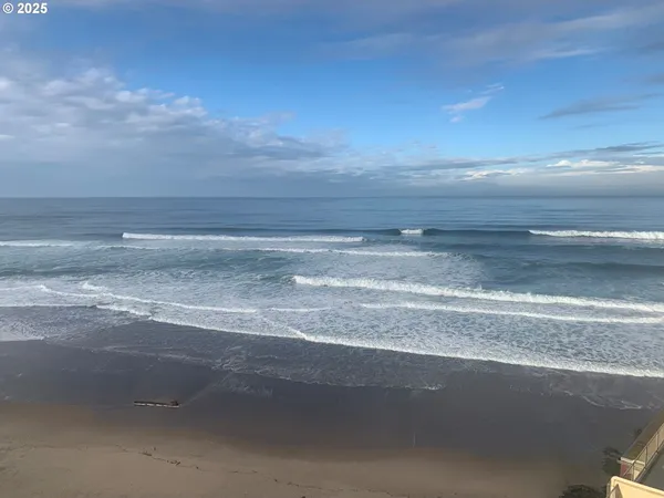 a view of beach and kitchen