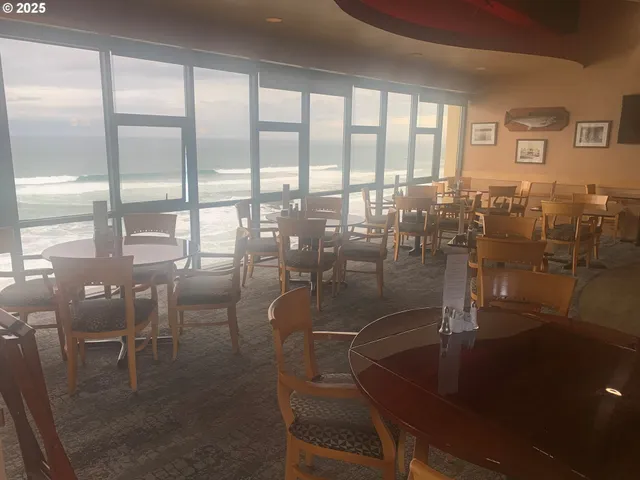 a room with lots of glass windows and glass door