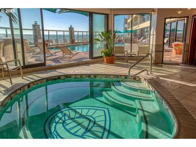 a backyard of a house with outdoor seating