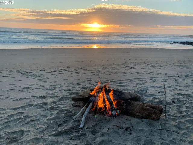 a view of beach and an ocean