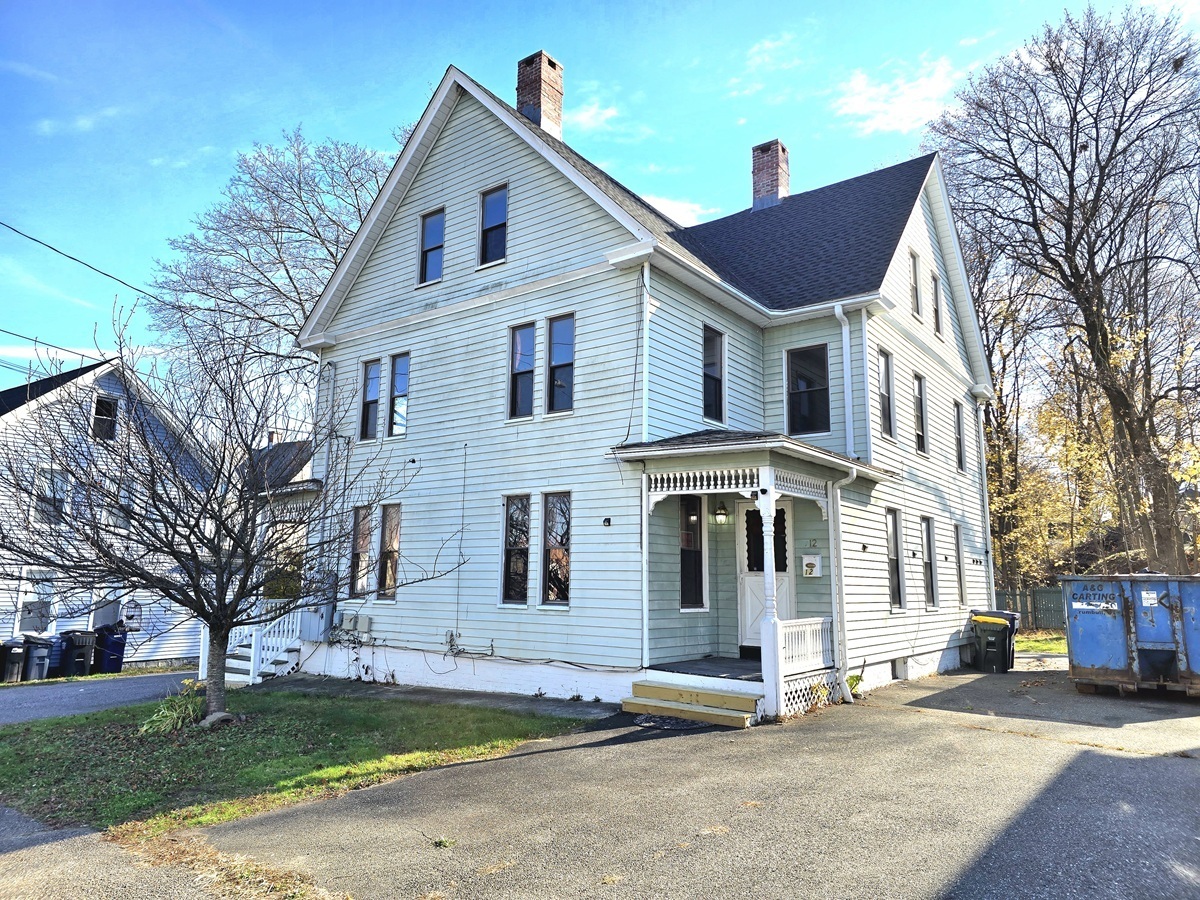 10 Clarkson Street Ansonia, CT 06401 - Photo 1 of 35 a front view of a house with a yard