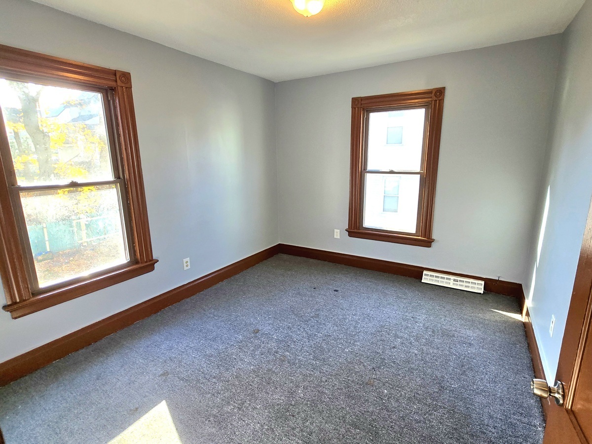 10 Clarkson Street Ansonia, CT 06401 - Photo 25 of 35 an empty room with a window