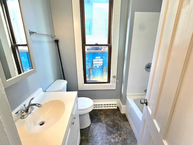 a view of entry way with wooden door